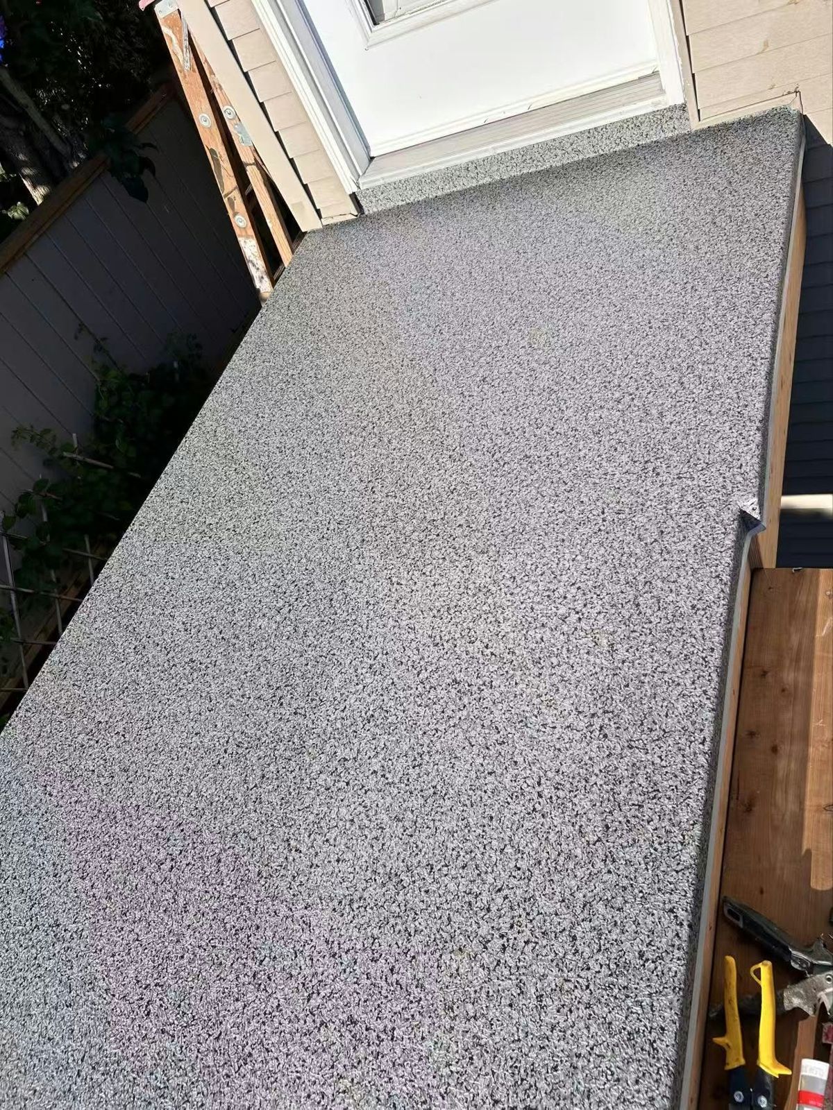 After: Narrow ledge: plywood to vinyl with edge flashing