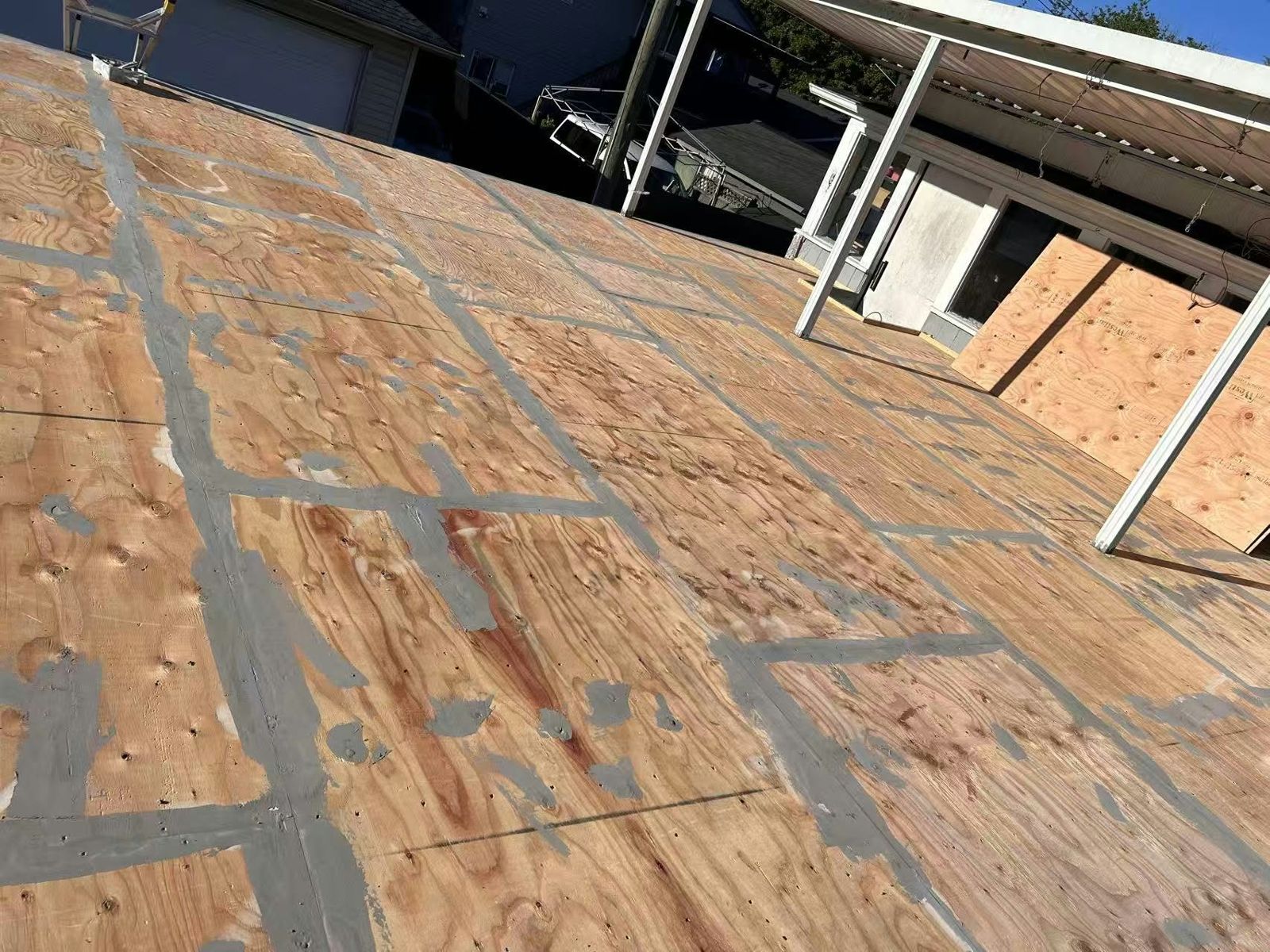 Plywood substrate with taped seams, prepped before vinyl